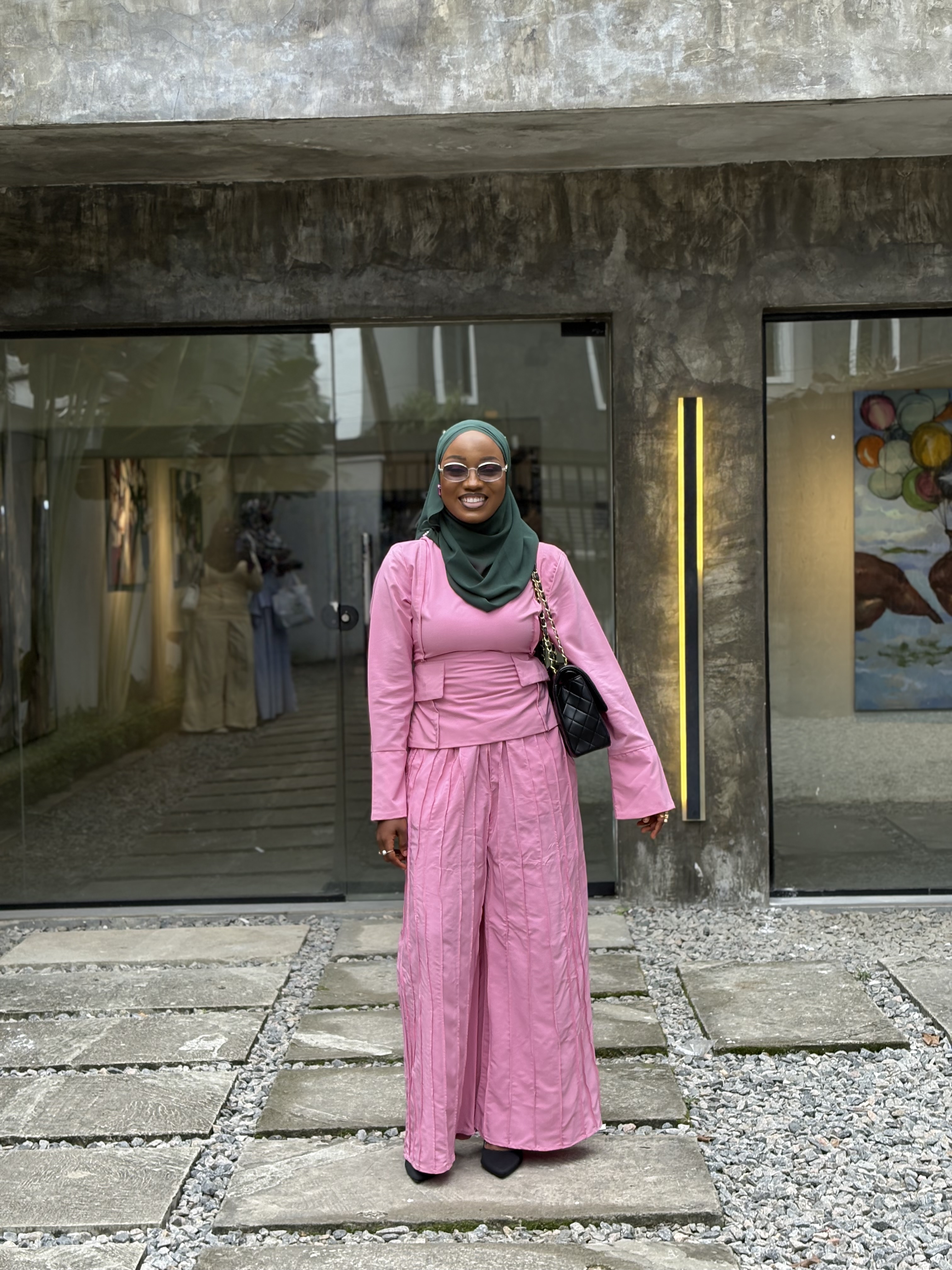 Portrait of OGUNOLA YUSROH OMOKOREDE